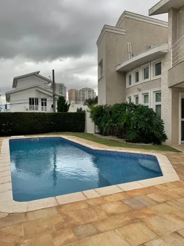 Casa/sobrado em condomínio para venda com 04 suítes e piscina - 550m² no Jardim Aquarius.