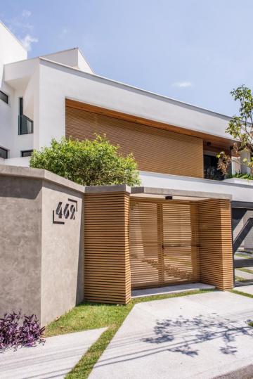 Casa em condomínio fechado para venda de 04 Dorm. e 04 Suítes - 510m² no Jardim das Colinas